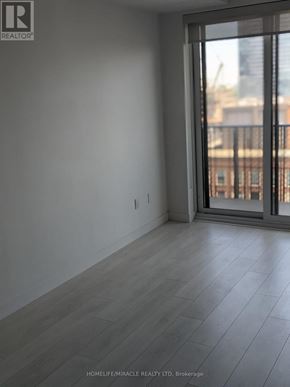 Toronto (Yonge-Eglinton) condo for rent - A room with a sliding glass door leading to a balcony.