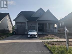 Loyalist (Bath) apartment for rent - A white car is parked in front of a house.