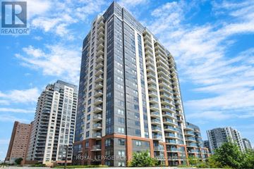 Toronto (Dovercourt-Wallace Emerson-Junction) condo for rent - A tall residential building with a balcony on the 10th floor.
