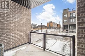 Niagara Falls (Morrison) townhouse for rent - A balcony with a view of a snowy street and buildings.