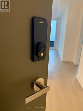 Mississauga (City Centre) condo for rent - A black doorbell mounted on a wall.