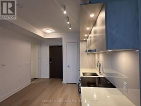 Mississauga (City Centre) condo for rent - A modern kitchen with a stainless steel sink and countertop.