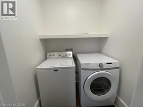 Kitchener apartment for rent - A washer and dryer in a laundry room.