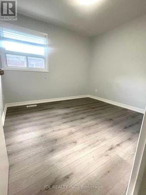 Toronto (Agincourt South-Malvern West) apartment for rent - A room with wooden flooring and a window.