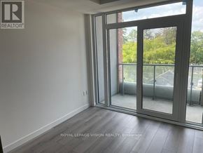 Toronto (Centennial Scarborough) condo for rent - A room with a sliding glass door leading to a balcony.