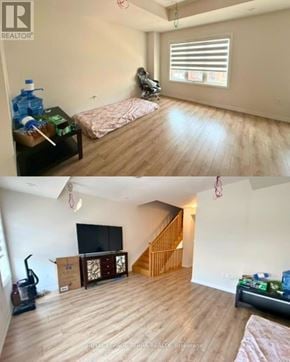 Oshawa (Windfields) townhouse for rent - A living room with a couch and a television.