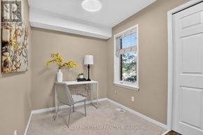 Ottawa townhouse for rent - A room with a desk and chair in it.