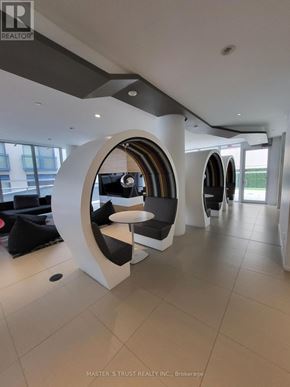 Toronto (Church-Yonge Corridor) condo for rent - A white and black circular seating area in a modern room.