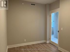 Markham (Unionville) condo for rent - A room with a door leading to a balcony.
