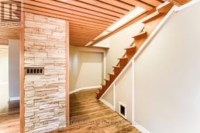 Pickering (Rosebank) apartment for rent - A stone pillar with a wooden beam above it.