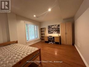 Toronto (Hillcrest Village) apartment for rent - A bedroom with a bed, desk, and chair.