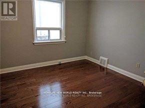 Toronto (Willowdale East) apartment for rent - A room with a window and wooden flooring.