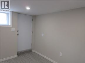 Hamilton apartment for rent - A room with a door and a window.