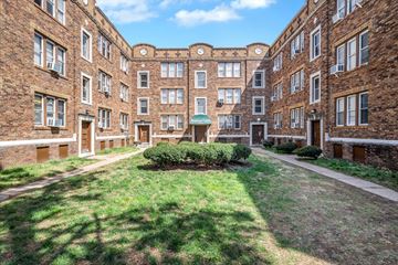 St. Louis apartment for rent - A courtyard surrounded by brick buildings.