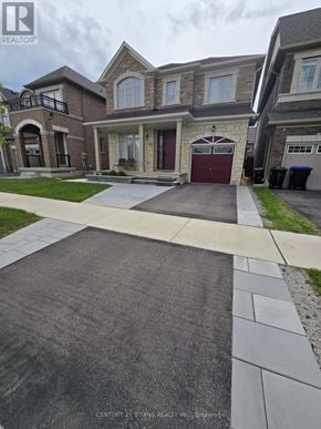 Bradford West Gwillimbury (Bradford) apartment for rent - A house with a driveway in front of it.