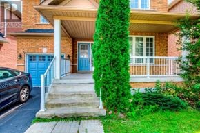Newmarket (Summerhill Estates) apartment for rent - A house with a blue door and a car parked in front.