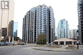 Toronto (Willowdale East) condo for rent - A cityscape with a large building in the center and a smaller one to the right.
