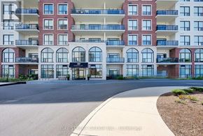 London North (North R) condo for rent - A large red brick building with a balcony on the second floor.