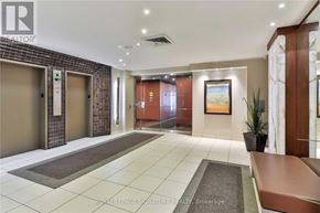 Toronto (University) apartment for rent - A hallway with a Royal LePage Signature Realty Brokerage logo on the wall.