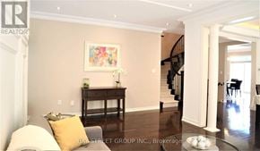 Richmond Hill (Oak Ridges) apartment for rent - A living room with a couch, a table, and a painting on the wall.