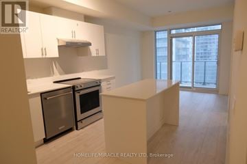 Vaughan (Vellore Village) condo for rent - A kitchen with white cabinets and stainless steel appliances.
