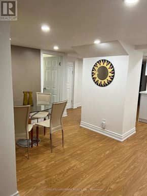 Vaughan (Patterson) apartment for rent - A dining room with a table and chairs.