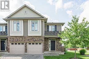 London North (North B) townhouse for rent - A two-story house with a garage is for sale.