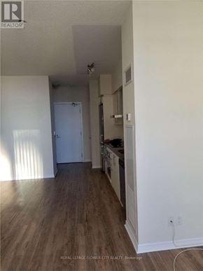 Toronto (Waterfront Communities) condo for rent - A room with a white door and a white wall.
