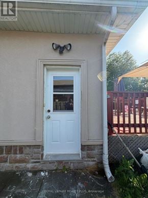 Mississauga (Mineola) apartment for rent - A white door with a small window above it.
