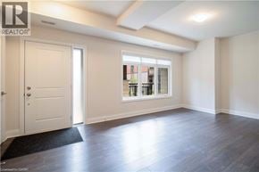 Paris townhouse for rent - A room with a door and a window with a view of a building outside.