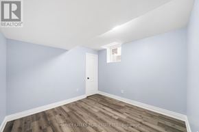 Brampton (Sandringham-Wellington) apartment for rent - A room with a door and a window with a white frame.