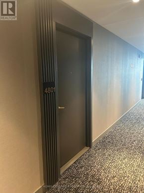 Vaughan (Vaughan Corporate Centre) condo for rent - A hallway with a door numbered 4801.