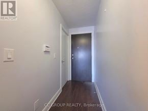 Toronto (Agincourt South-Malvern West) condo for rent - A hallway with a door at the end.