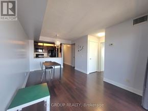 Toronto (Agincourt South-Malvern West) condo for rent - A room with a table and chairs in it.