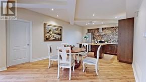 Toronto (Newtonbrook West) apartment for rent - A dining room with a wooden table and chairs.