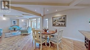 Toronto (Newtonbrook West) apartment for rent - A dining room with a wooden table and chairs.