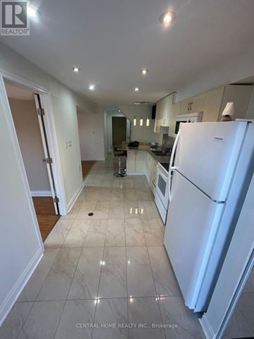 Richmond Hill (Westbrook) apartment for rent - A white refrigerator is in the kitchen of a house.