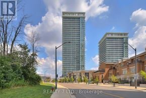 Mississauga (City Centre) condo for rent - A street view with two buildings and a sign for REALTY 7 LTD., Brokerage.