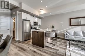 London North (North R) condo for rent - A modern kitchen with a dining table and chairs.