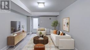 Toronto (Dufferin Grove) apartment for rent - A living room with a white couch, a wooden coffee table, and a flat-screen TV.