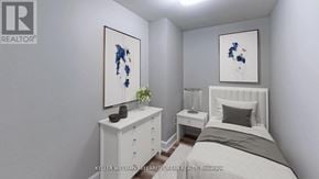 Toronto (Dufferin Grove) apartment for rent - A bedroom with a bed, nightstand, and a painting on the wall.