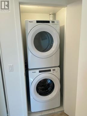 Milton (Cb Cobban) condo for rent - A white washing machine and dryer in a small cabinet.