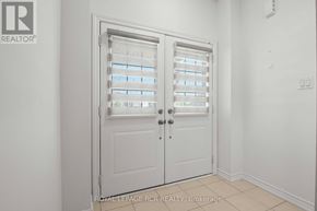 Southgate apartment for rent - A white door with a glass window and a handle.