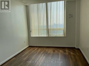 Toronto (Henry Farm) condo for rent - A room with wooden floors and a window with blinds.