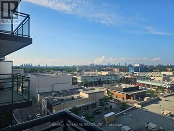 Toronto (Banbury-Don Mills) condo for rent - A view from a high-rise building looking out over a cityscape.