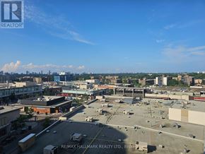 Toronto (Banbury-Don Mills) condo for rent - A view of a cityscape from a high vantage point with a clear blue sky.