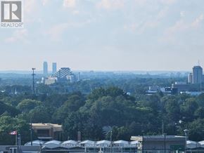 Toronto (Banbury-Don Mills) condo for rent - A cityscape with buildings and trees in the foreground.