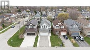London North (North I) apartment for rent - A neighborhood with houses and cars parked in front.