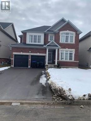 Collingwood apartment for rent - A house with a garage and a driveway in front of it.