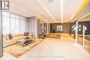 Toronto (Church-Yonge Corridor) condo for rent - A spacious living room with a sofa, coffee table, and glass doors.
